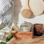 brown wooden chopping board beside clear glass jar